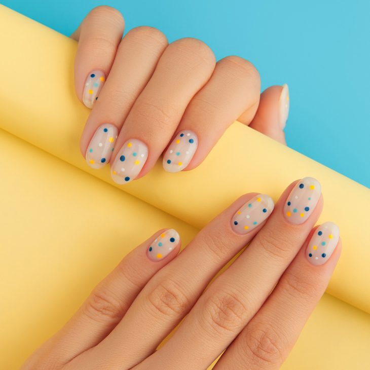 Minimalist Nail Art Ideas That Aren't Boring : Shimmery Pink Short Nails  with Flower