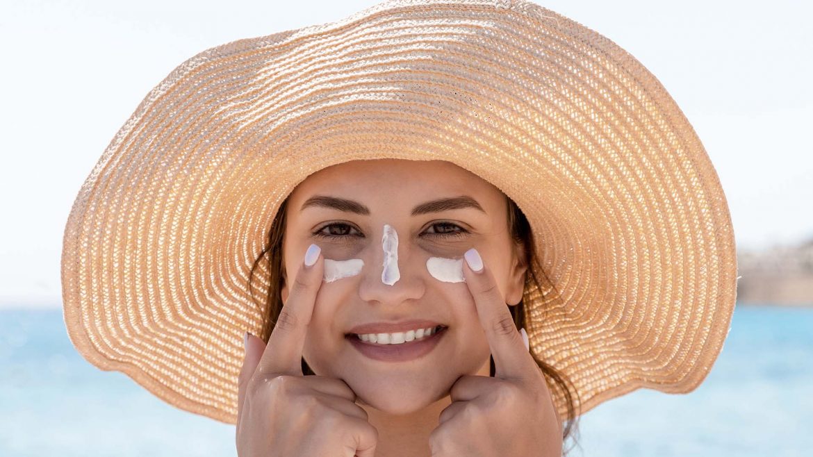 Woman with de-tanning product on her face