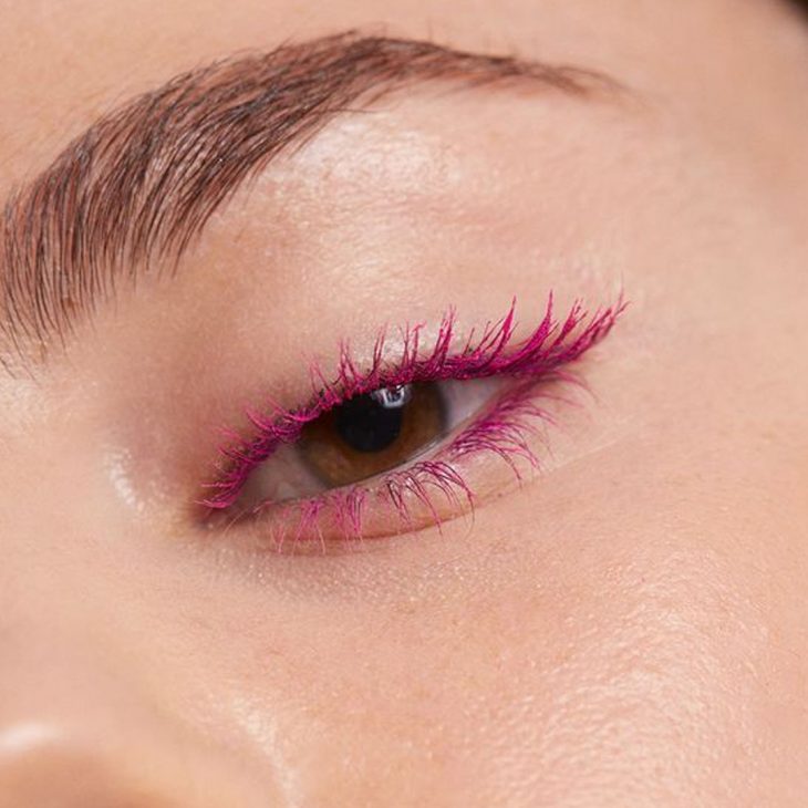 Woman wearing coloured mascara