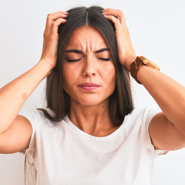 A woman suffering from dizziness