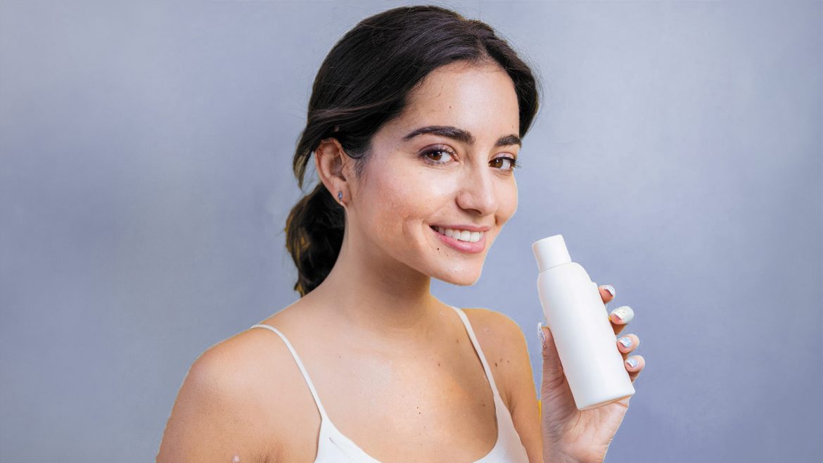 Woman holding a skincare product