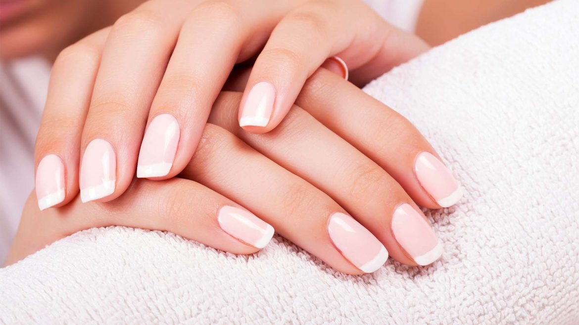 Woman with  French manicure 