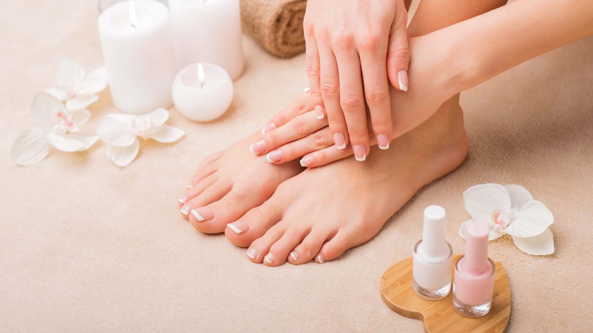 Woman doing French Manicure at Home
