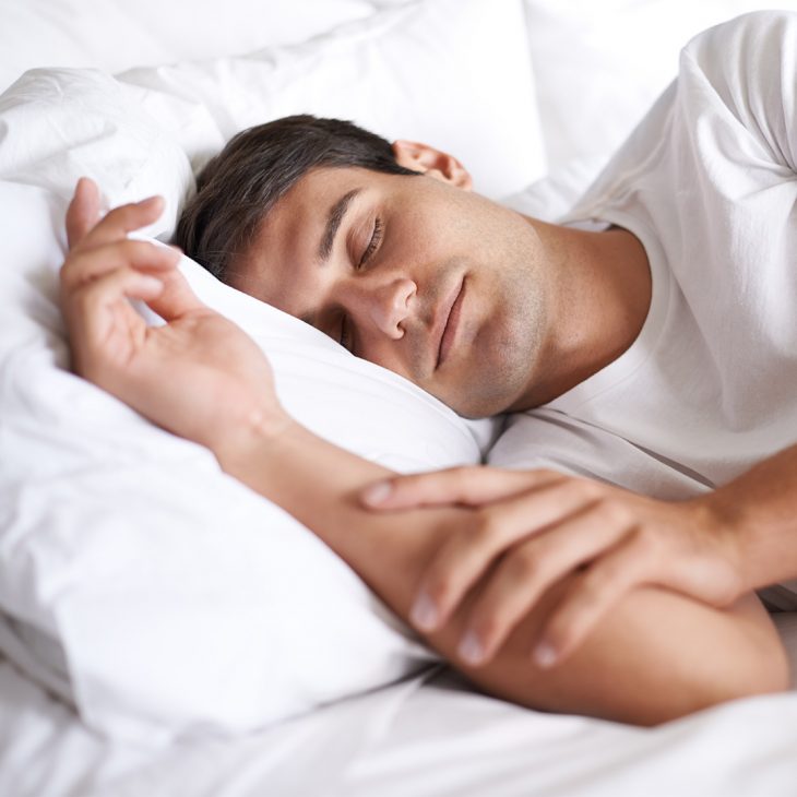 Man sleeping on a clean pillow