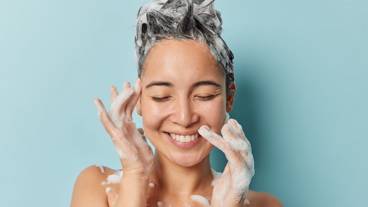 Woman shampooing her hair