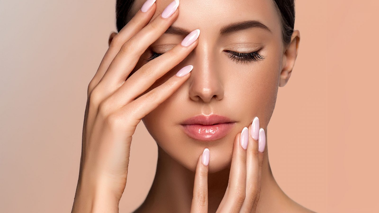 Woman with French manicured nail