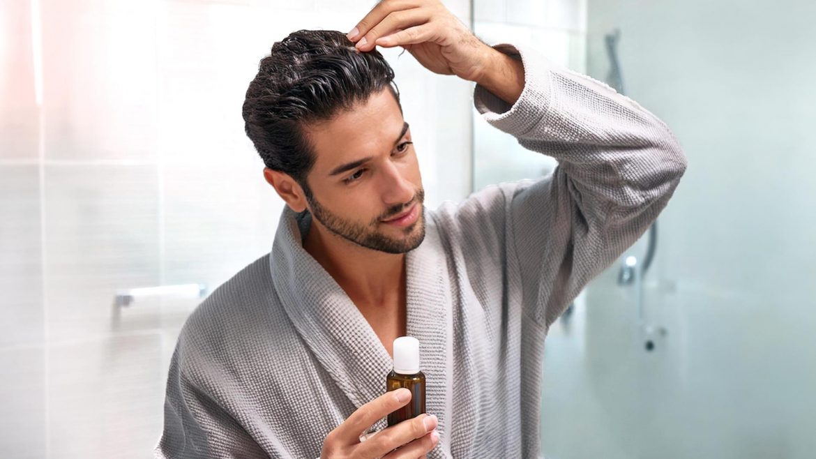 Man applying hair serum