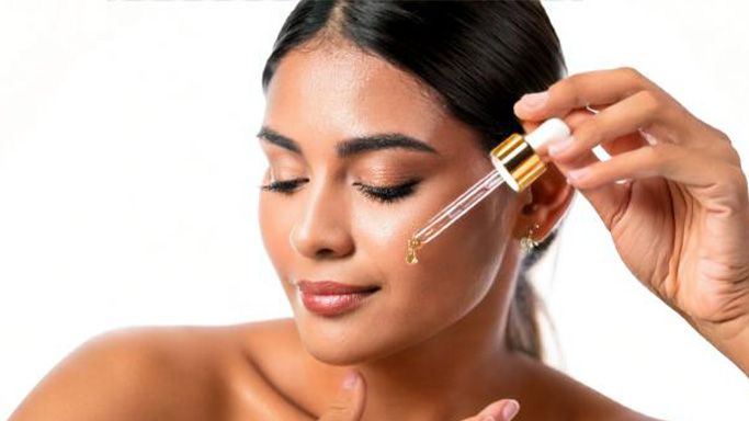 Woman using face oil