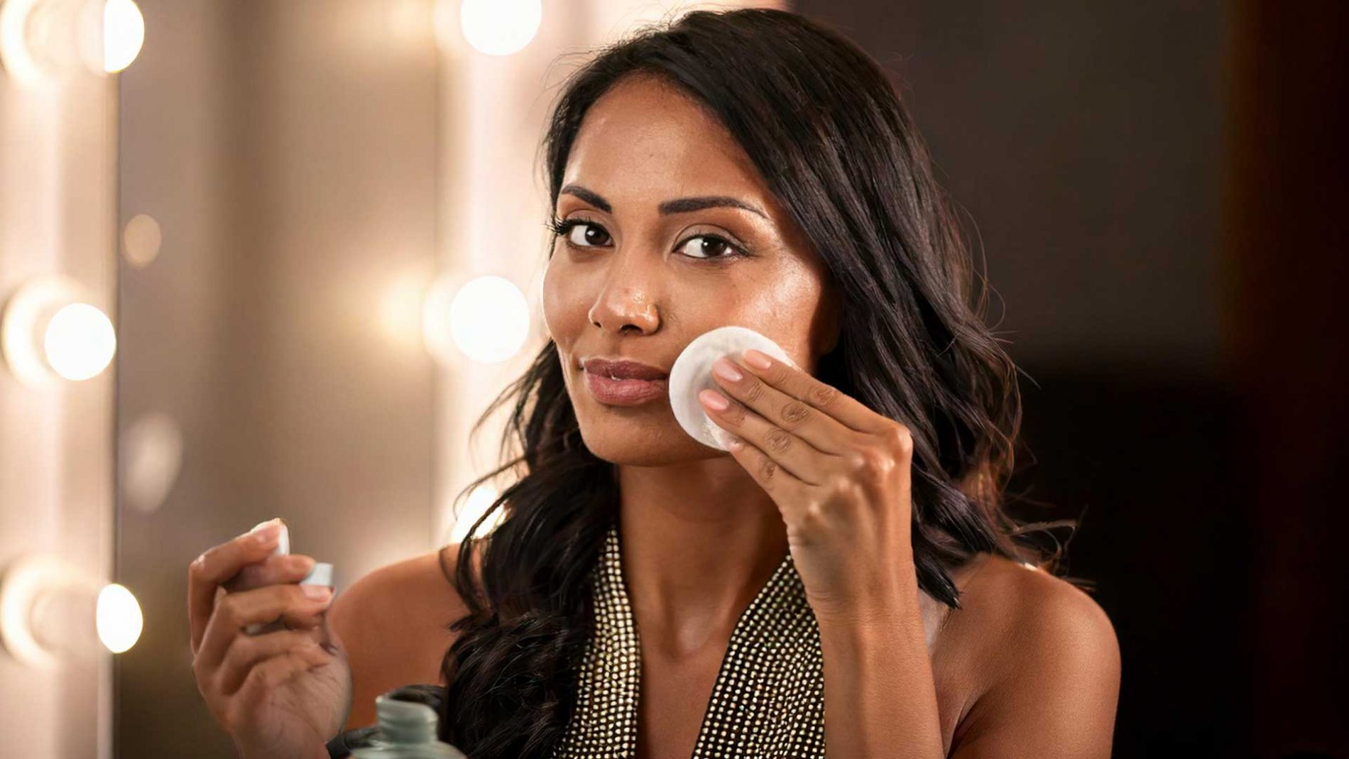 Woman removing her makeup