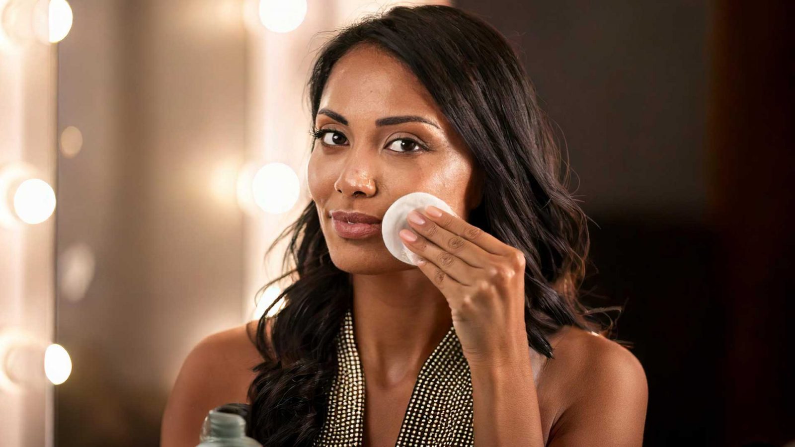 Woman using a makeup wipe