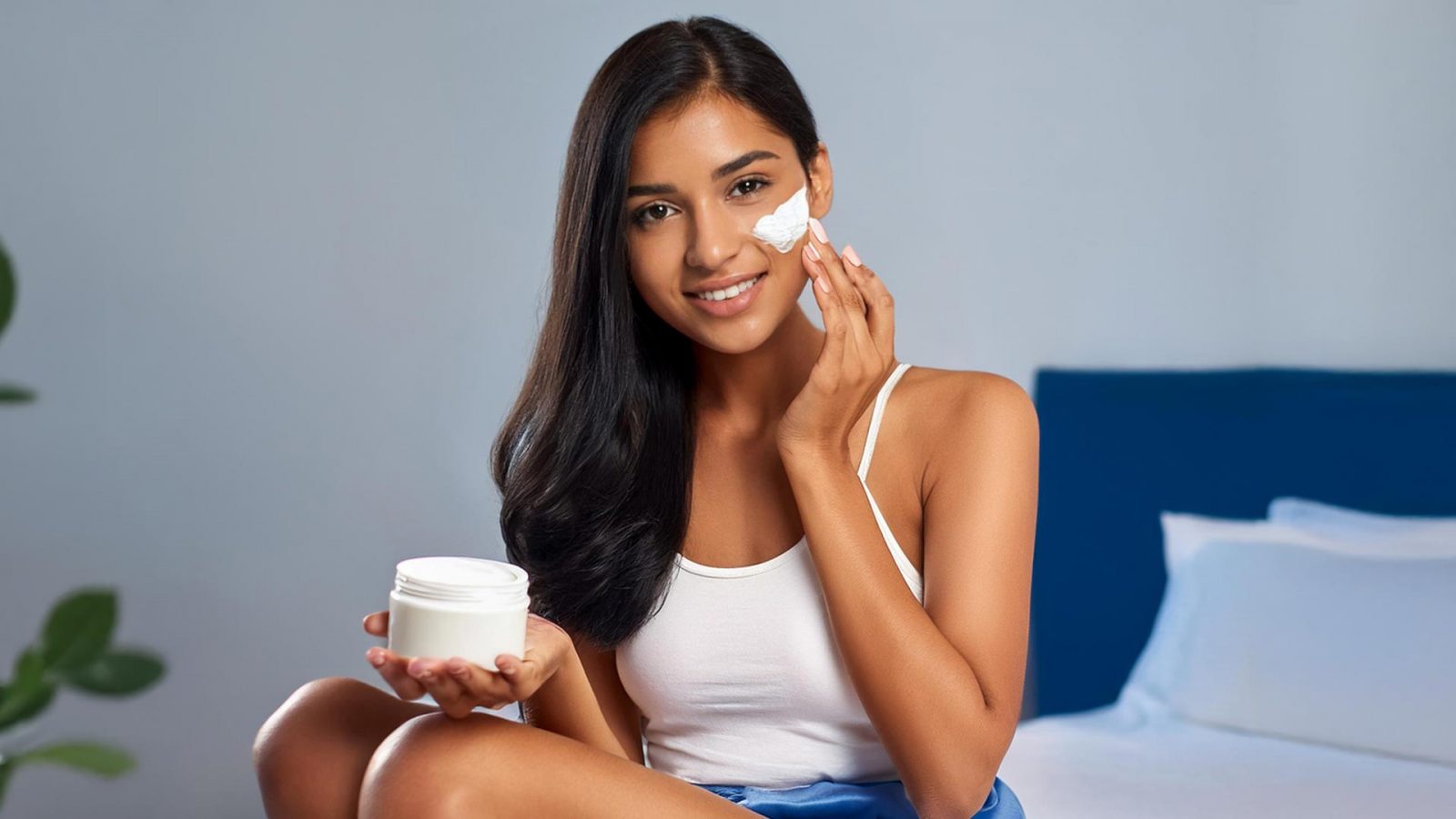 Woman applying a mask from a facial kit